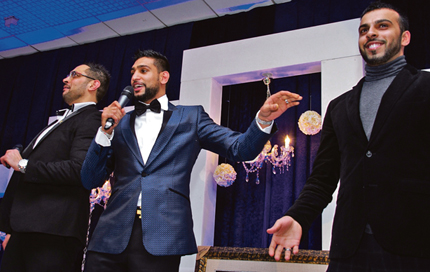 HOSTS: The evening was a major success with hosts (l-r) Sajjad Hussain, Amir Khan and Mohammed Sajid
