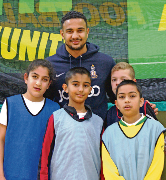 KICK-IT-OUT: Bradford City star, James Meredith, presented medals to each competitor on the day and was happy to pose for pictures with participants