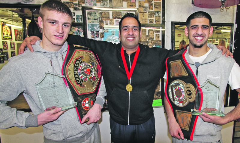 PROUD: Coach Wahid Hussain shows off new champs Reece Cartwright (left) and Zahid ‘Magic Man’ Hussain (right)
