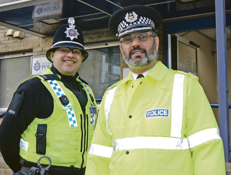 FINAL ROUNDS: Jawaid Akhtar (right) and his son, Moshin, patrolled the streets of Huddersfield for one final time last week