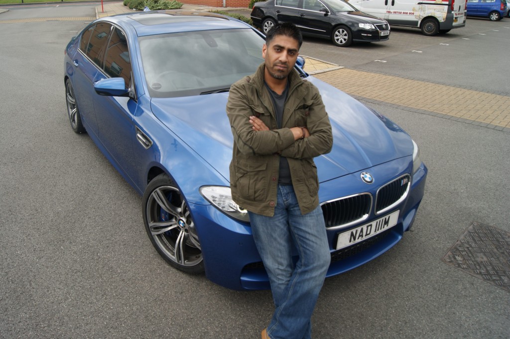 FOUND: Nadim Hanif’s blue BMW M5 was initially stolen in a knifed carjacking in Birmingham, yet after a group of friends headed to the city from Leeds to track it down, they were reunited with the vehicle using a simple phone app. Pictured here is a member of the search group, Shaf Ahmad