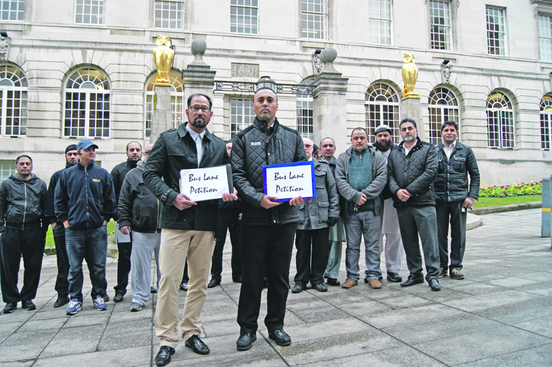 HAND-OVER: Drivers gathered in Leeds last week to formally hand over the petition at the Civic Hall