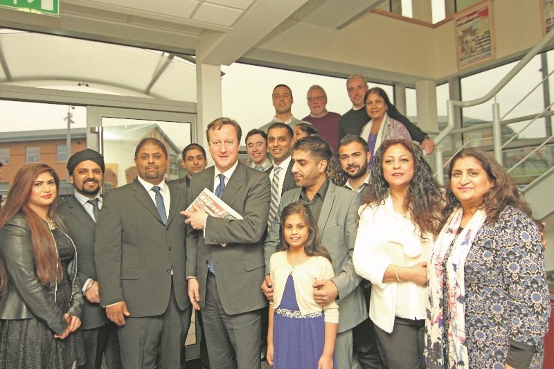 MEETING: Mr Cameron visited the Asian Express offices earlier this month