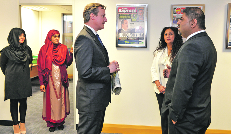 TOUR: Founders of Asian Express Nadim and Andleeb Hanif show the Prime Minister around the building and discuss the paper