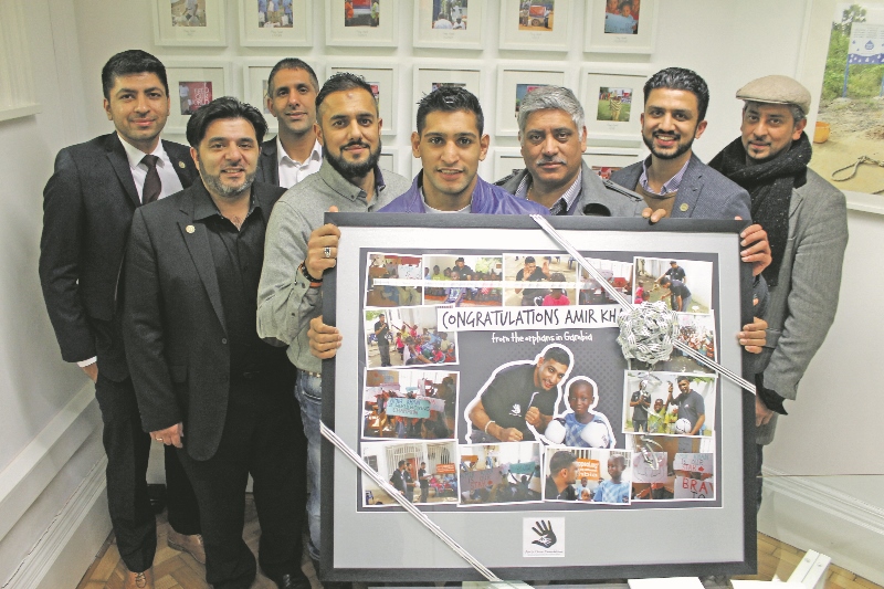 DETERMINED: Amir Khan was welcomed to Wakefield’s Penny Appeal charity last week as he committed to helping orphans in The Gambi