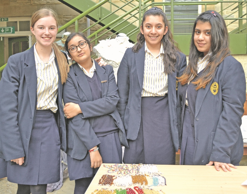 BUSINESS: Jana Braun-Wilson, Amn Bashir, Maleehah Aziz and Muskaan Amini sold the bracelets at school to help impoverished people in India