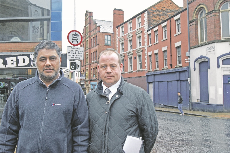 APPEAL: LPHDA director, Dale Askham, and PHV driver, Tasadaq Hussain, stand at the site of Leeds’ newest bus lane