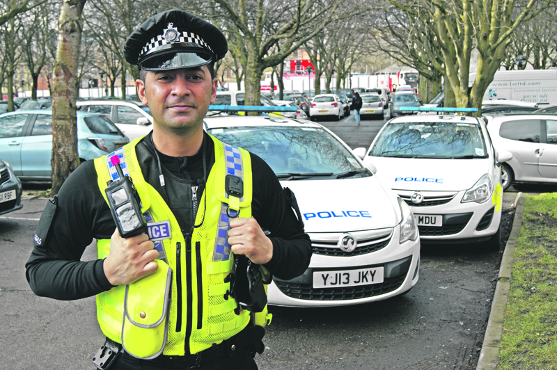 BRAVE: PC Umer Saeed helped rescue a woman and her children from the house fire earlier this month by smashing a window to gain entry