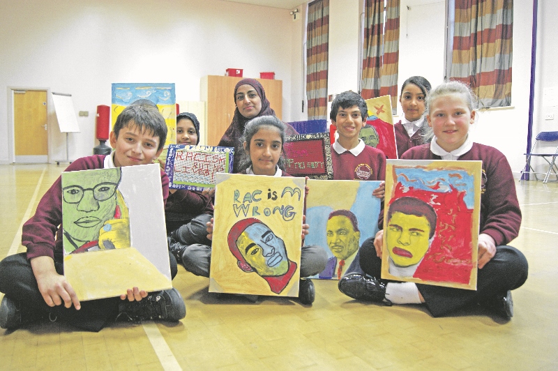 AARTY: Pupils from Horton Grange Primary School have been involved in a number of art projects as part of their annual Stephen Lawrence Week, pictured with equalities co-ordinator, Mrs Niela Ahmed
