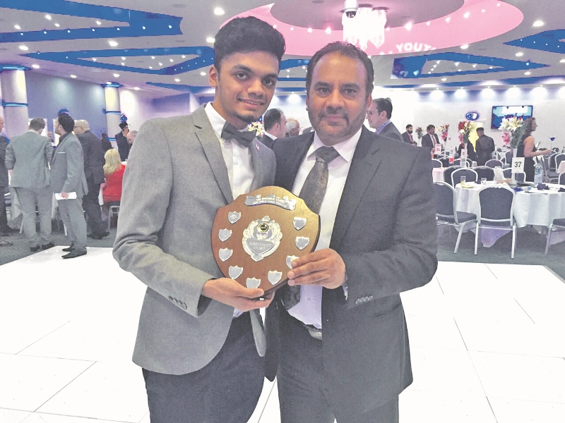 SUCCESS: Abdul Basit received his trophy last weekend from Nasir Awan - the uncle of Muhammad Yaseen in whose memory the award was named
