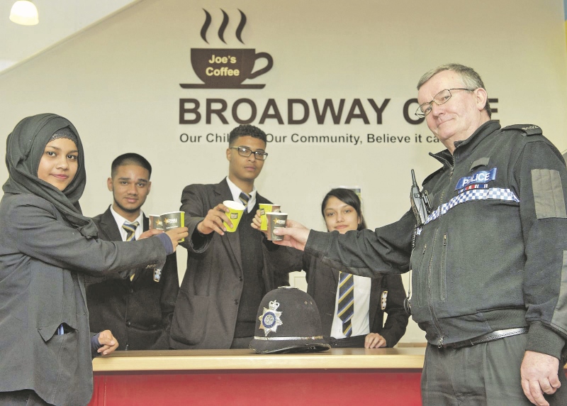 OPEN: Students celebrate the launch of the newly branded cafe with ‘PC Joe’ (pictured l-r) Year 11 pupils: Annica Khanom, Sajjidur Rahman, Abdul Salah, and Anishah Ahmed, and PC Joe Cahill