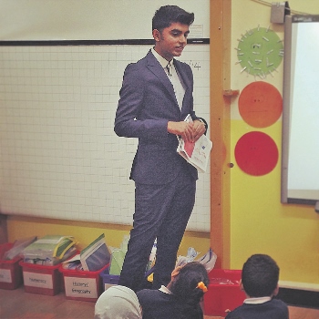 LESSONS: Following his success in the literary field, Aukash has been invited into primary schools to help promote poetry in the youth