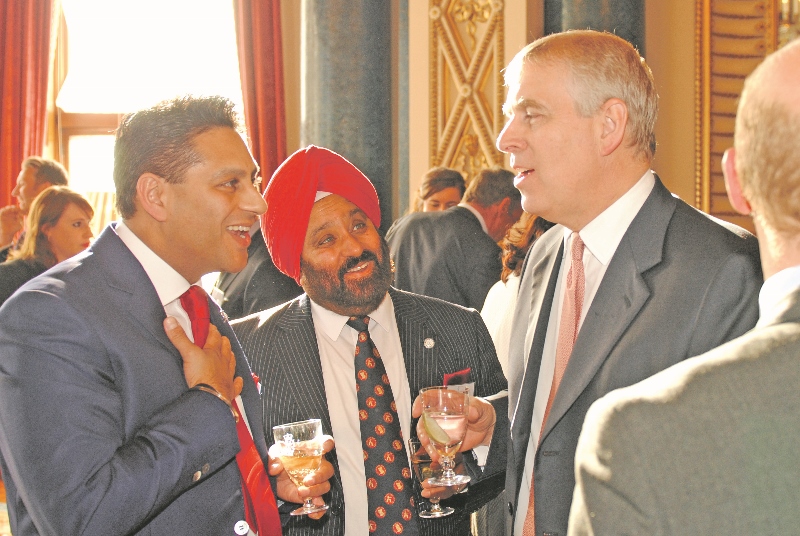 HONOURED: Nirmal Singh MBE and Simmy Sekhon were invited to Buckingham Palace on behalf of the Duke of York, Prince Andrew