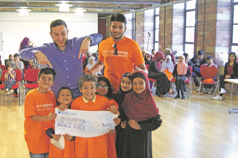 HANDOVER: The cheque was presented to Penny Appeal fundraiser, Khalil Benkhalil, by children from the madrassa