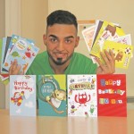 CARDS: Faisal Zakar, fundraising team member at the InTouch Foundation, shows just some of the cards already donated to the birthday card appeal