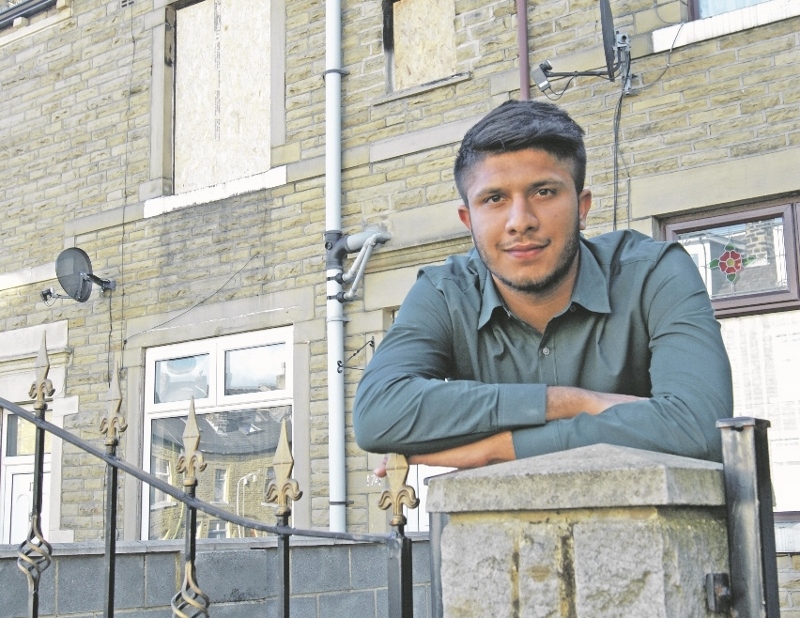 HERO: Aamir Nawaz rescued a baby from a burning house after hearing calls for help upon returning home from football training