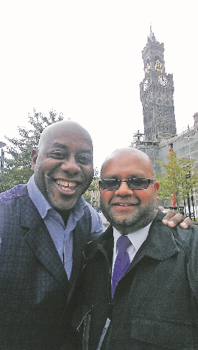 COOKING: Khalil Alam and Ainsley Harriott try out some pakoras in Bradford city centre