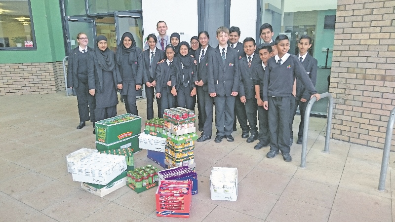 SUPPORT: Students from the UAK collected food for the charity drive as well as raising over £200