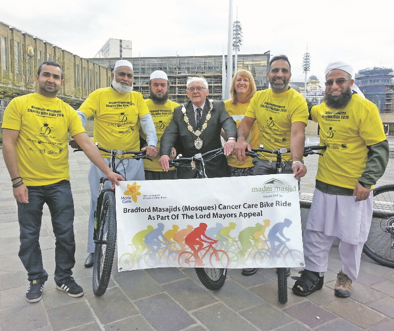 DETERMINED: Having raised over £3,000 previously, Rifaqat Ali and the group at Madni Masjid previously took on a series of cycling challenges, including a London to Paris bike ride. In the picture (L-R) Imran Akbar, Zahoor Ahmed, Mufti Jamil Ahmed, Cllr L'Amie, Sharon Link from Marie Curie, Nazakat Ali and Rifaqat Ali