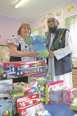 HANDOVER: It is the third year in a row that NADA has completed their Eid toy distribution