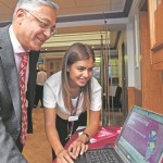 OPEN DAY: Chairman, Lord Kamlesh Patel of Bradford, hears how the hospitals' new electronic patient records (EPR) system will work when it goes live across the Foundation Trust in 2016 from EPR change manager, Sophia Khan.