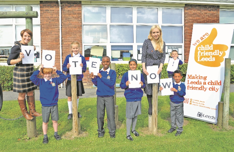 SUPPORT: (l-r) Cllr Lucinda Yeadon with Archie, Hannah, Elijah, Prableen, Cllr Alice Smart, Eesah and Oscar helping to launch the third Child Friendly Leeds Awards, at Talbot Primary School