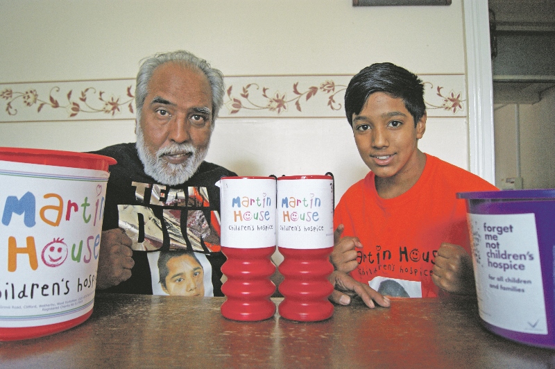 FAMILY: Father and son, Mohammed and Rizwan Aslam, have organised a nine-mile run this weekend to raise funds for two local children’s hospices