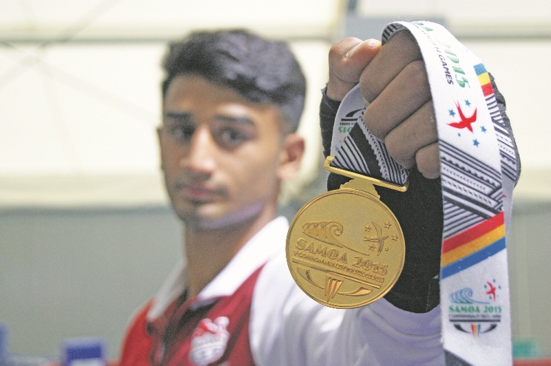 CHAMPION: Harris Akbar clinched Gold in the welterweight boxing category at the Commonwealth Youth Games