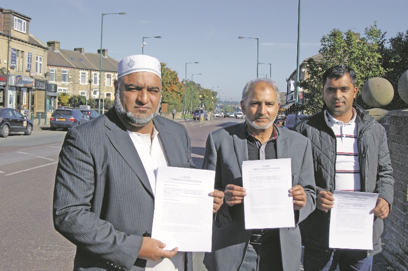 CAMPAIGNING: Amjad Malik (left) is gathering signatures across Bradford in an attempt to get speed cameras installed on three major roads