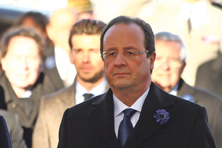 RESOLUTE: President Francoise Hollande said France will not cower in the shadow of terrorism