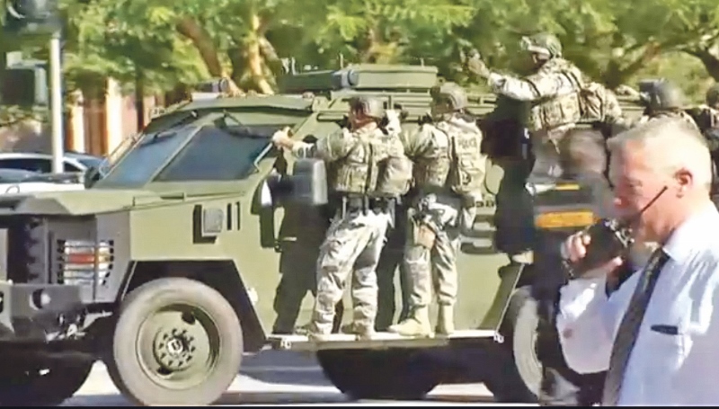 NATIONAL GUARD: Full military and police response was required