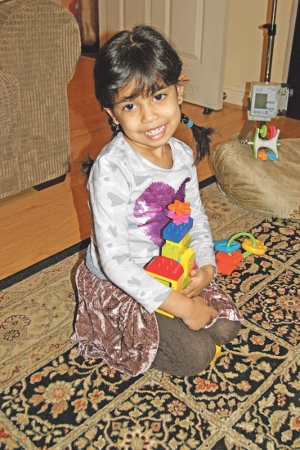 HAPPY: Khadija is a happy young girl