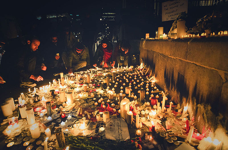 VIGIL: Londoners lighting candles last year for the victims of the school massacre in Pakistan