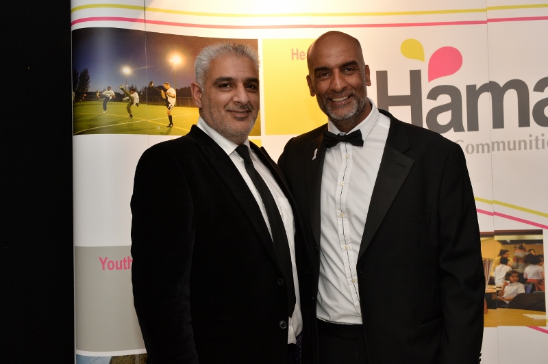 HAPPINESS: Tariq celebrating with Hanif Malik, CEO of the Hamara Centre