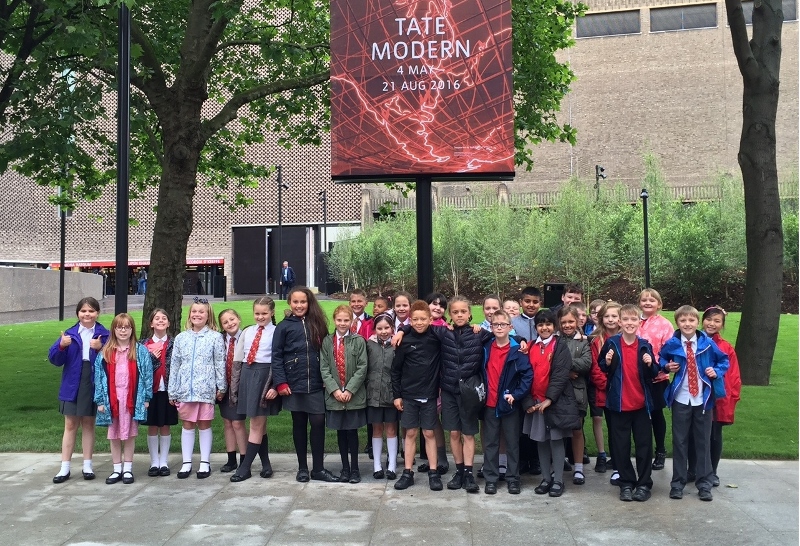 SPECIAL INVITE: Children from St Francis Catholic Primary School outside the re-opened Tate Modern gallery