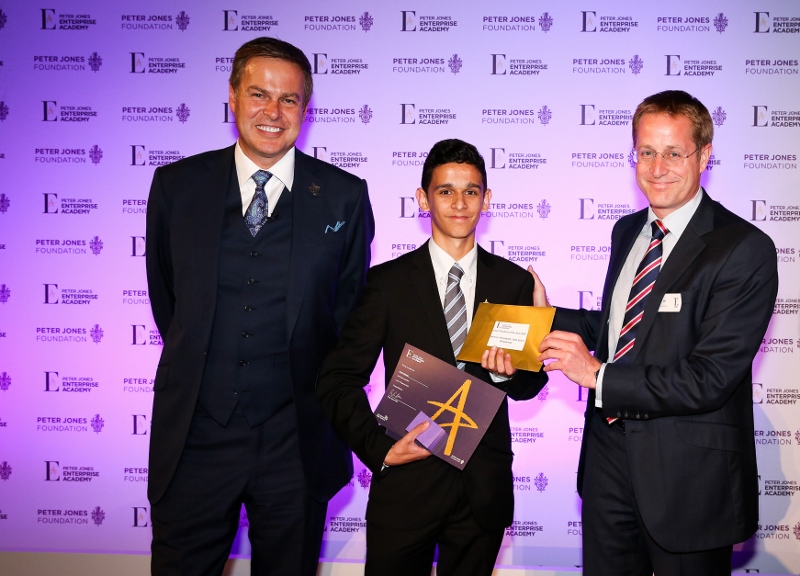 SMART WAY TO SUCCESS: Arun Kumar receives his prize from Peter Jones and Senior Vice President of Brandpath ,Nick Wilcox
