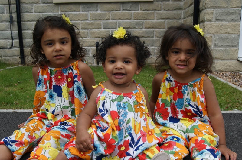 TRAUMATISED: Sisters, Sienna, Sophia and Aniyah, from Bradford, were amongst 11 family members forced to leave a plane last month