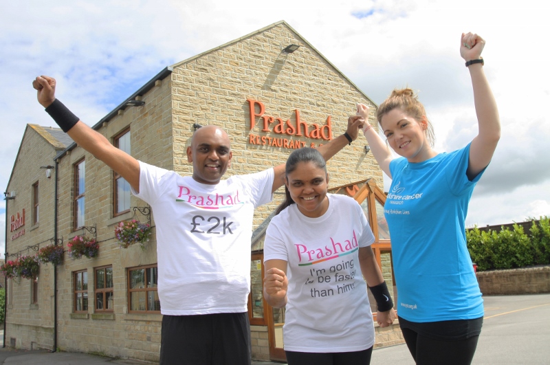 CHARITABLE: Bobby Patel celebrates raising £2,000 for Yorkshire Cancer Research with his wife, Minal, and Stephanie Jones, Regional Fundraiser for West Yorkshire at the charity