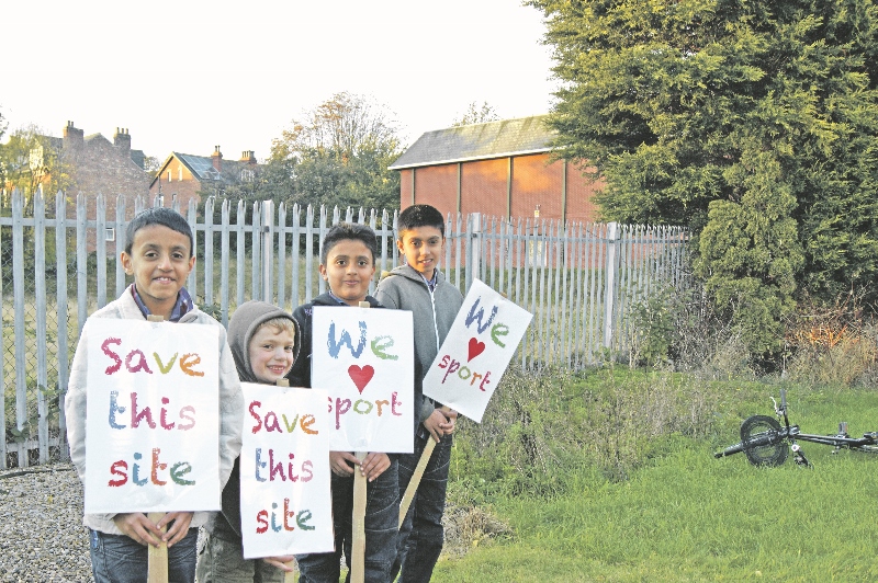 HYDE PARK PROTEST: Kids with banners want to save their playing field on Victoria Road