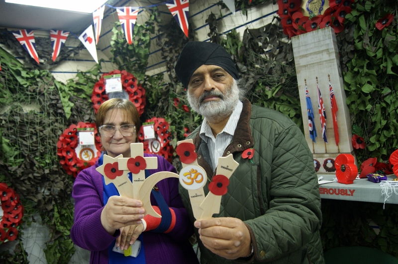 SUPPORTING THE FORCES: Balbir Singh and Sheila Scott display some of the different products available in Kirkstall Market’s Royal British Legion store