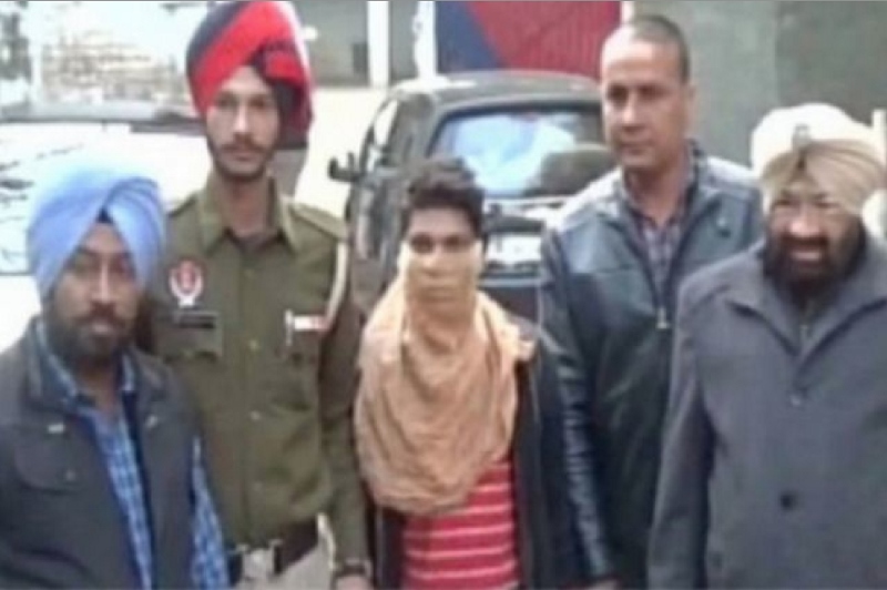 ACCUSED: Police in India claim that 16-year-old Vikesh Kumar (centre of picture) ate his 9-year-old cousin’s body parts and drank his blood