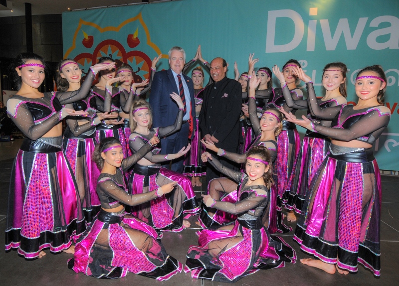 FUSION OF CULTURES: Indian Honorary Consul to Wales Raj Aggarwal with Carwyn Jones and dancers at the Diwali event last year