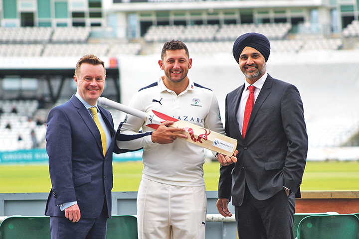 BRAND AMBASSADOR: Switalskis’ John Durkan and Ranjit Uppal with cricket star Tim Bresnan