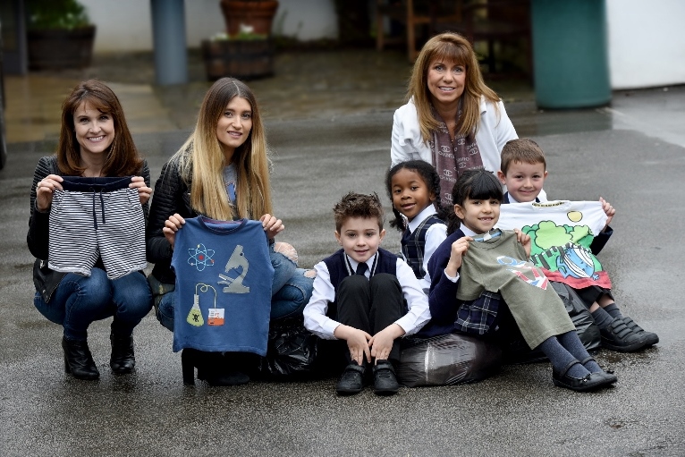 INVOLVED: Sorting the clothes are (L-R) Gillian Kearney, Charley Webb and Caron Munro with Rose Court pupils (L-R): Buster, Karis, Anya and Oli.