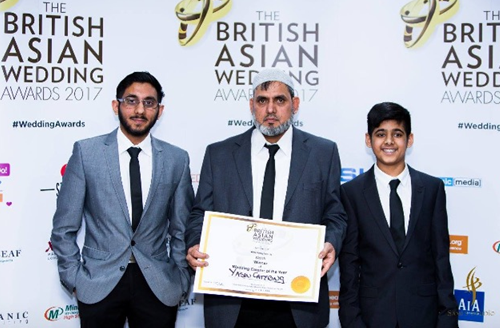 PROUD: Founder, Head Chef and Director of Yasin Catering Ltd - Mohammed Yasin with his sons, Aqib (L) and Ibrahim (R) collecting a much-coveted accolade at the Asian Wedding Awards