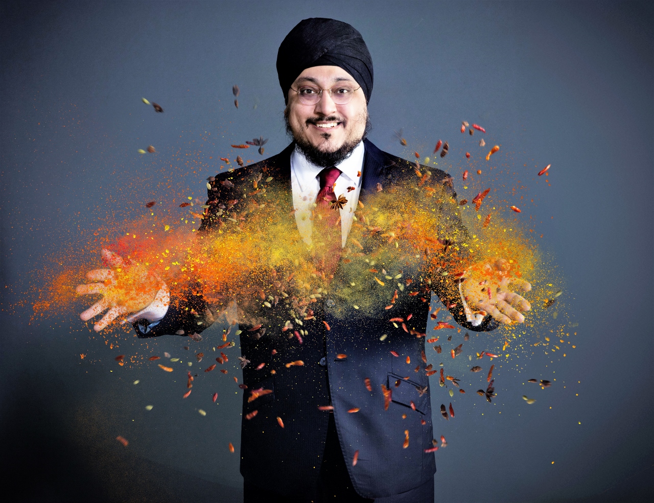DELIGHTED: Dr Jason Wouhra OBE Director of East End Foods Plc sizzles with spicy delight at being awarded an Honour