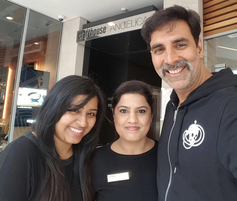 BUZZING: Staff at Leeds beauty salon ‘Hind’ - Narinder Kaur and Asma Nourine with Akshay Kumar