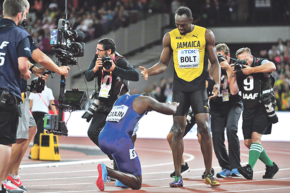 Justin Gatlin bows in homage to Usain Bolt, the fastest man ever