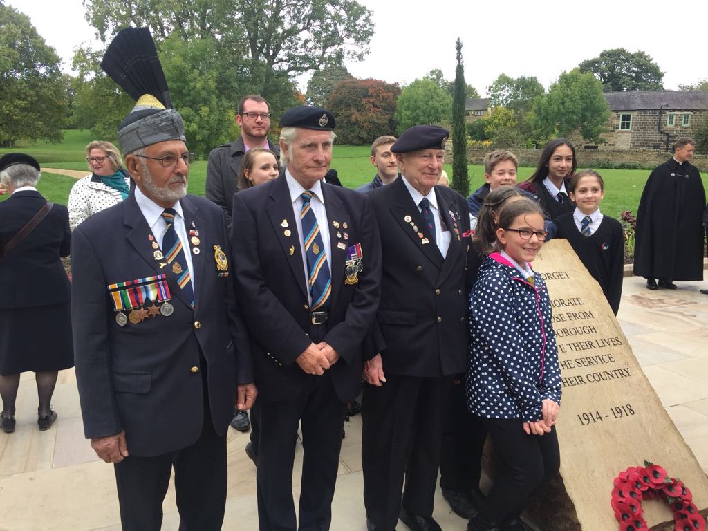 The remembrance celebration of those who gave their life in service joined together with smiles from different generations