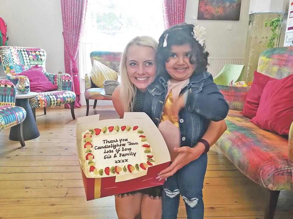 Little Gia with Candlelighters family support manager Natalie